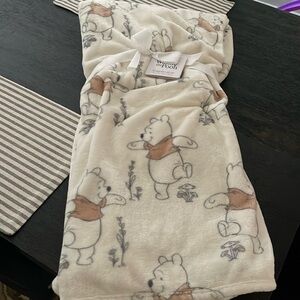 Winnie the Pooh Throw. Brand new with tags.
